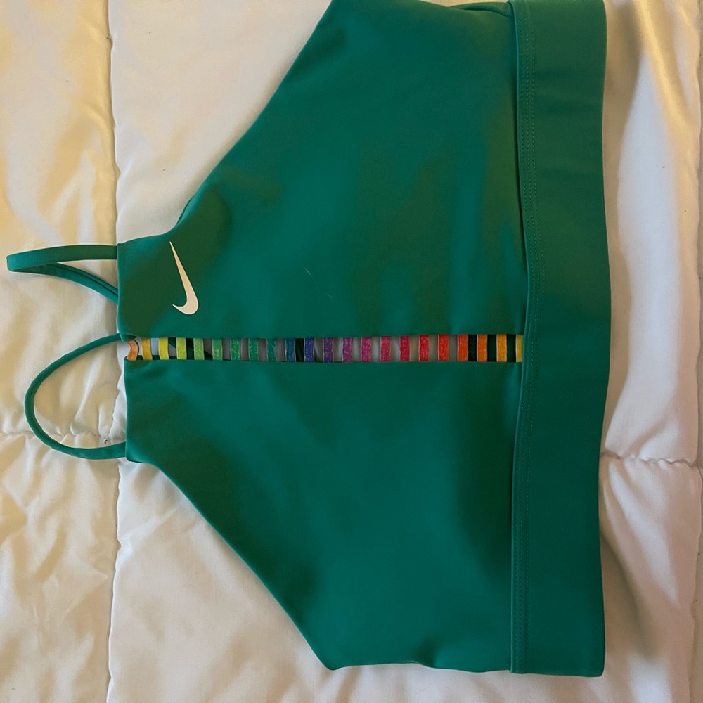 Nike. Sports bra. With open stripes centered.